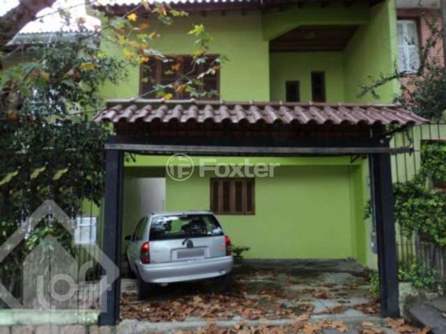 Casa com 3 quartos à venda na Rua Pedro Velho, 264, Partenon, Porto Alegre, 180 m2 por R$ 390.000