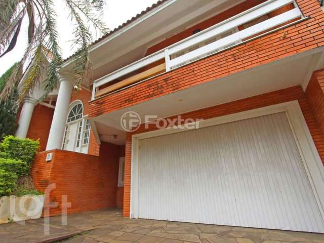 Casa com 3 quartos à venda na Rua Professora Cecy Cordeiro Thofehrn, 94, Sarandi, Porto Alegre, 250 m2 por R$ 800.000