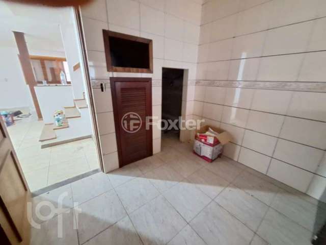 Casa com 3 quartos à venda na Rua Norival Paranaguá de Andrade, 65, Hípica, Porto Alegre, 156 m2 por R$ 525.000