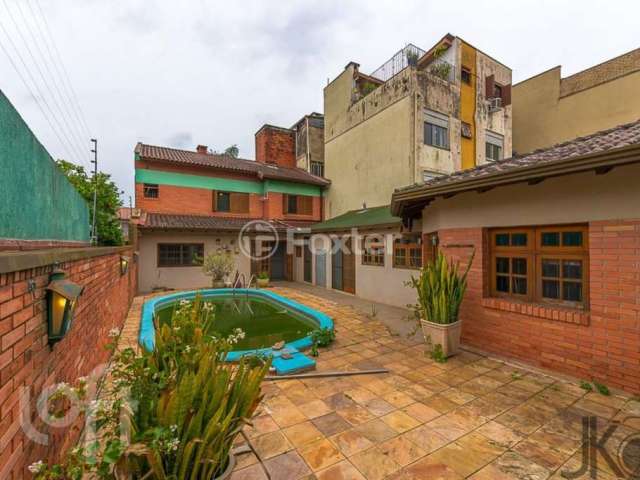 Casa com 6 quartos à venda na Rua Santa Flora, 882, Nonoai, Porto Alegre, 239 m2 por R$ 810.000