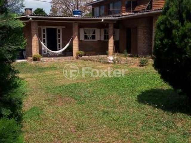 Casa em condomínio fechado com 3 quartos à venda na Rua Aragua, 140, Águas Claras, Viamão, 250 m2 por R$ 480.000