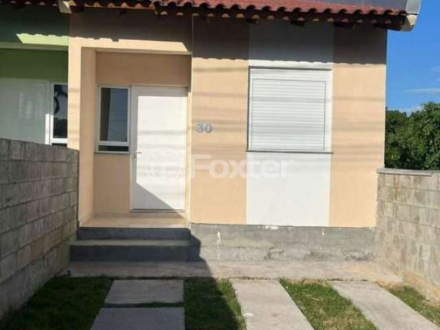 Casa com 2 quartos à venda na Travessa Christovam Siqueira, 30, Neópolis, Gravataí, 44 m2 por R$ 209.000