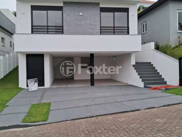 Casa em condomínio fechado com 3 quartos à venda na Avenida Senador Salgado Filho, 8500, Vila Augusta, Viamão, 330 m2 por R$ 1.280.000