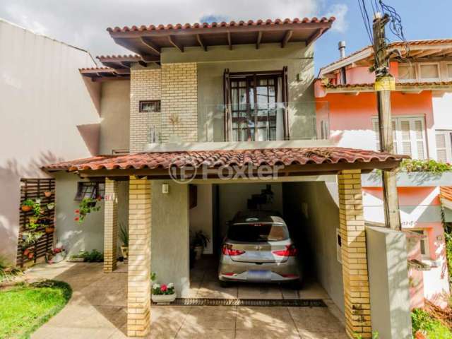 Casa em condomínio fechado com 3 quartos à venda na Rua Erechim, 100, Nonoai, Porto Alegre, 187 m2 por R$ 750.000