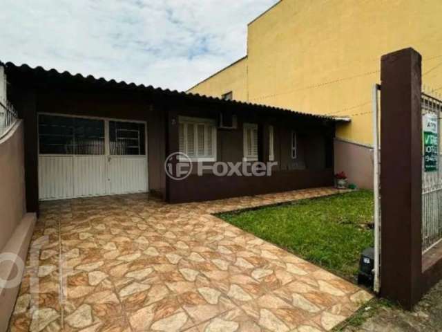 Casa com 2 quartos à venda na Quadra E Dois, 31, Guajuviras, Canoas, 120 m2 por R$ 299.900