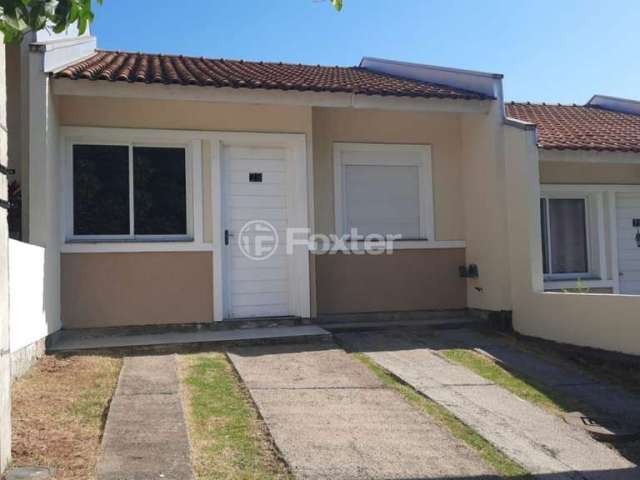 Casa em condomínio fechado com 2 quartos à venda na Rua Oscar Schick, 2350, Formoza, Alvorada, 66 m2 por R$ 259.000