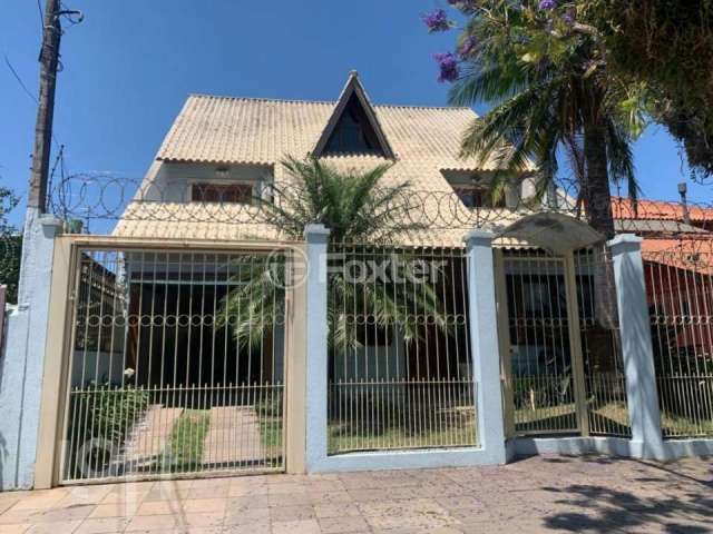 Casa com 4 quartos à venda na Rua São Sebastião do Cai, 11, Camaquã, Porto Alegre, 330 m2 por R$ 1.750.000