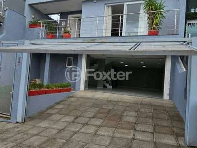 Casa em condomínio fechado com 4 quartos à venda na Rua Walter Porto Filho, 240, Mário Quintana, Porto Alegre, 284 m2 por R$ 895.000