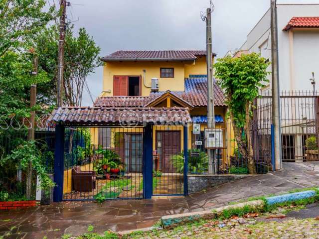 Casa com 4 quartos à venda na Rua Antônio Ribeiro, 160, Santo Antônio, Porto Alegre, 180 m2 por R$ 950.000