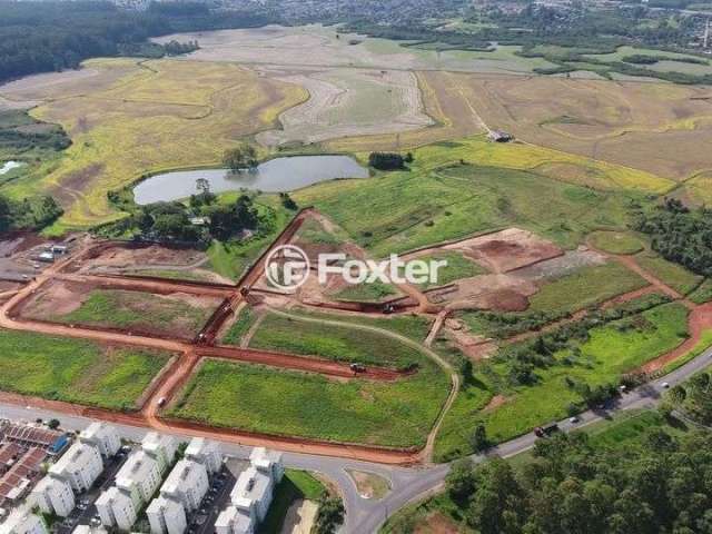 Terreno em condomínio fechado à venda na Avenida Hispânica, 495, Guajuviras, Canoas, 200 m2 por R$ 108.000