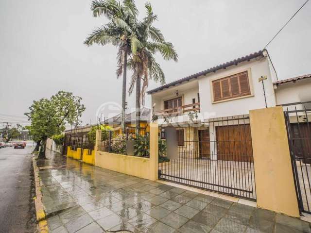 Casa comercial com 3 salas à venda na Rua Otávio Dutra, 76, Santa Tereza, Porto Alegre, 238 m2 por R$ 1.172.000