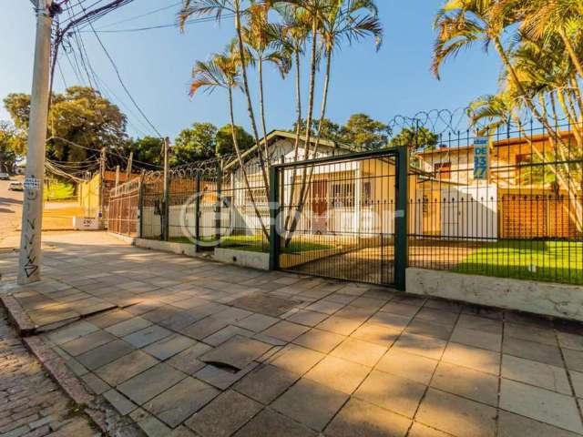 Casa com 4 quartos à venda na Rua General Gomes Carneiro, 16, Medianeira, Porto Alegre, 216 m2 por R$ 550.000