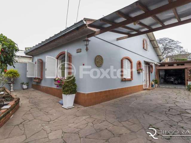 Casa com 3 quartos à venda na Rua Bernardo Guimarães, 148, Partenon, Porto Alegre, 235 m2 por R$ 495.000