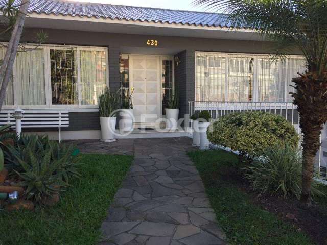 Casa com 5 quartos à venda na Avenida General Barreto Viana, 430, Chácara das Pedras, Porto Alegre, 392 m2 por R$ 1.550.000