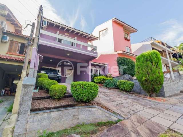 Casa em condomínio fechado com 3 quartos à venda na Rua Erechim, 100, Nonoai, Porto Alegre, 190 m2 por R$ 730.000