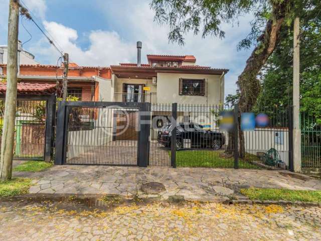 Casa com 3 quartos à venda na Rua Cassino, 75, Ipanema, Porto Alegre, 379 m2 por R$ 980.000