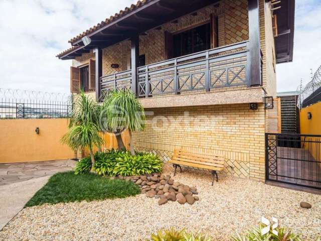 Casa com 3 quartos à venda na Avenida Cai, 917, Cristal, Porto Alegre, 454 m2 por R$ 1.980.000