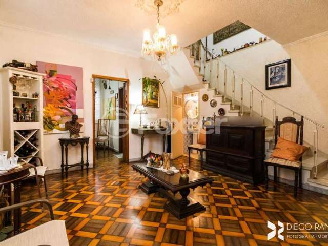 Casa com 3 quartos à venda na Rua Eudoro Berlink, 204, Auxiliadora, Porto Alegre, 145 m2 por R$ 1.250.000
