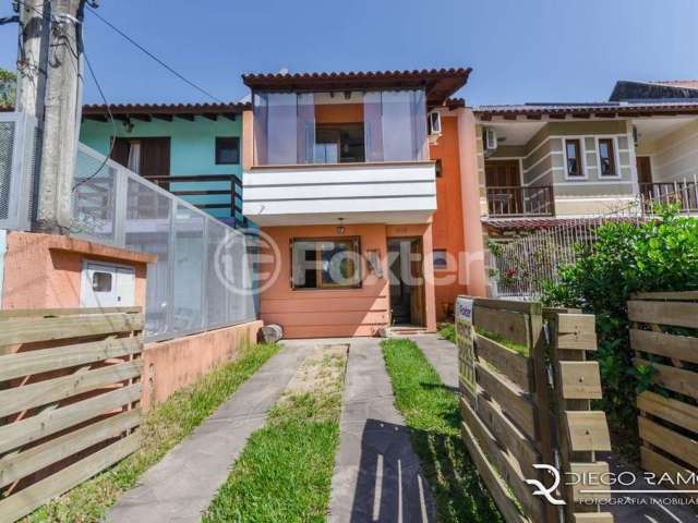 Casa com 3 quartos à venda na Rua Vacaria, 255, Hípica, Porto Alegre, 125 m2 por R$ 450.000