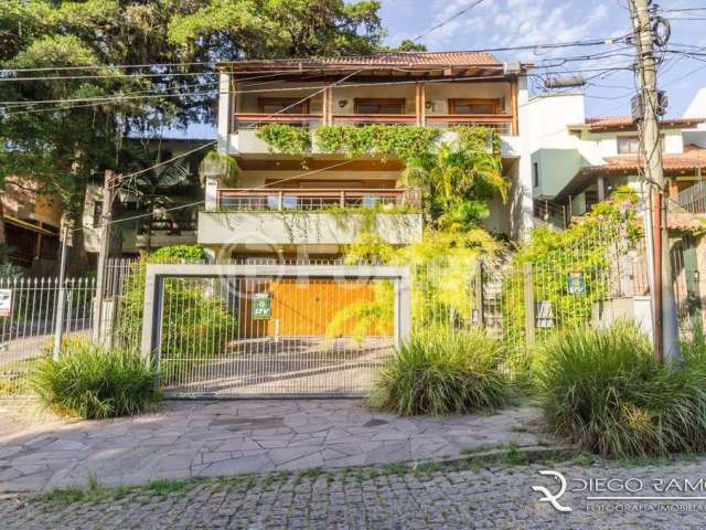 Casa com 5 quartos à venda na Rua Edgar Luiz Schneider, 460, Jardim Isabel, Porto Alegre, 427 m2 por R$ 1.590.000