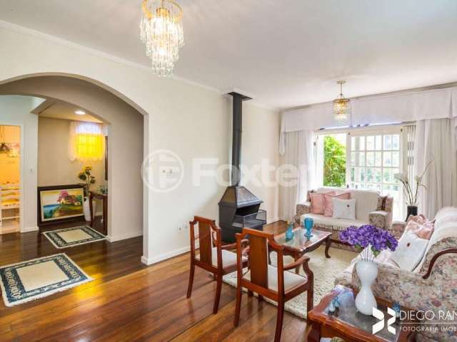 Casa com 4 quartos à venda na Rua Graciano Azambuja, 341, Partenon, Porto Alegre, 247 m2 por R$ 780.000