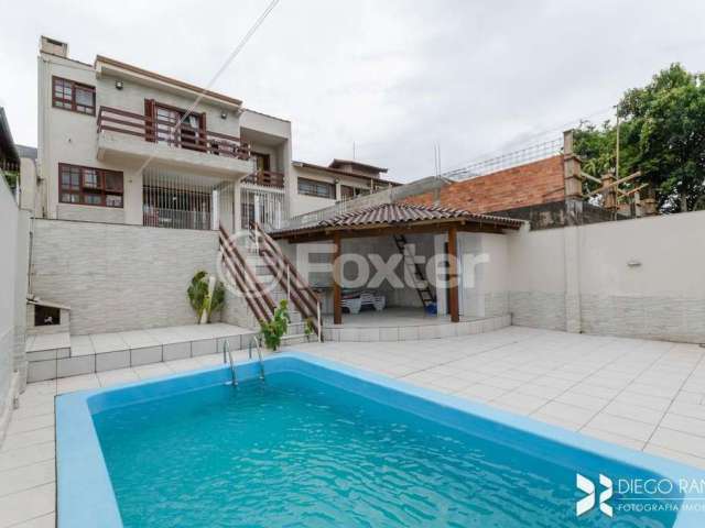 Casa com 4 quartos à venda na Rua Paul Harris, 130, Jardim Itu Sabará, Porto Alegre, 245 m2 por R$ 1.450.000