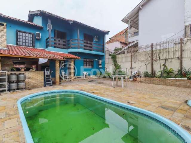 Casa com 3 quartos à venda na Rua Luís Euríco Tejera Lisboa, 45, Parque Santa Fé, Porto Alegre, 260 m2 por R$ 550.000