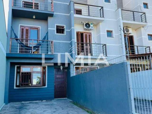 Casa com 3 quartos à venda na Rua Hugo Nelson Magalhães, 141, Parque Santa Fé, Porto Alegre, 170 m2 por R$ 427.900