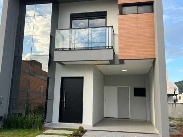 Casa em Condomínio com 187m2 3 dormitorios, suite  , alto Padrao de acabamento  em Biguaçu SC