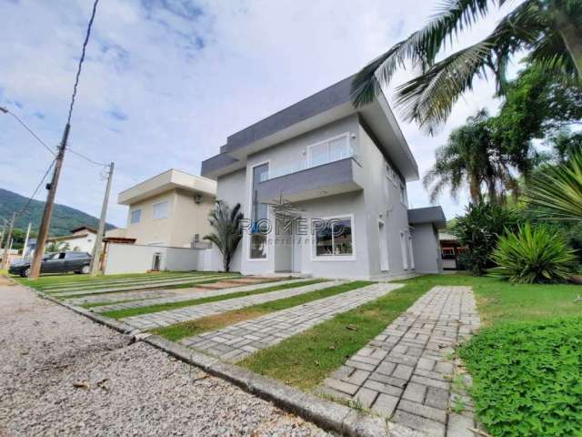 Casa em condomínio fechado com 5 quartos à venda na Av. do Engenho Velho, 1391, Praia da Lagoinha, Ubatuba, 375 m2 por R$ 1.750.000