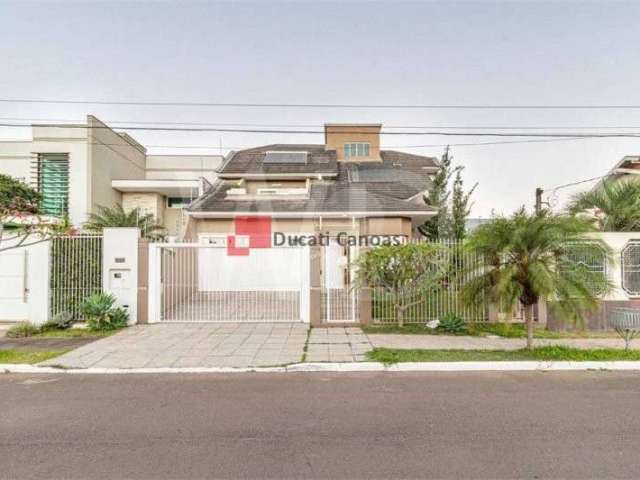 Casa com 3 quartos à venda na Rua Noruega, Marechal Rondon, Canoas, 256 m2 por R$ 1.600.000