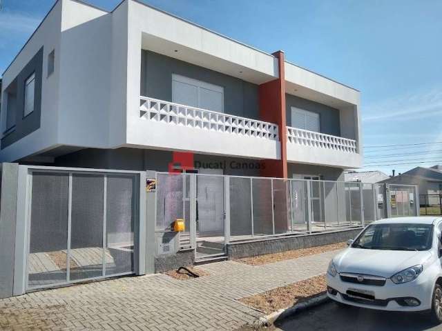 Casa com 3 quartos à venda na Rua dos Marmelos, Igara, Canoas, 115 m2 por R$ 590.000