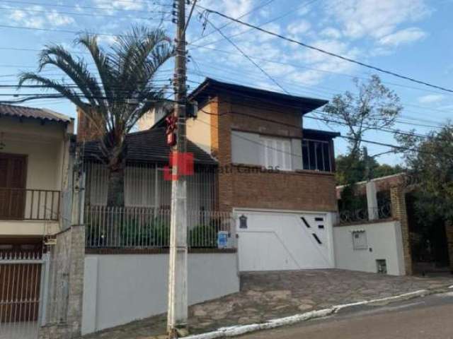 Casa com 4 quartos à venda na Rua Sepé Tiaraju, Centro, Canoas, 244 m2 por R$ 990.000