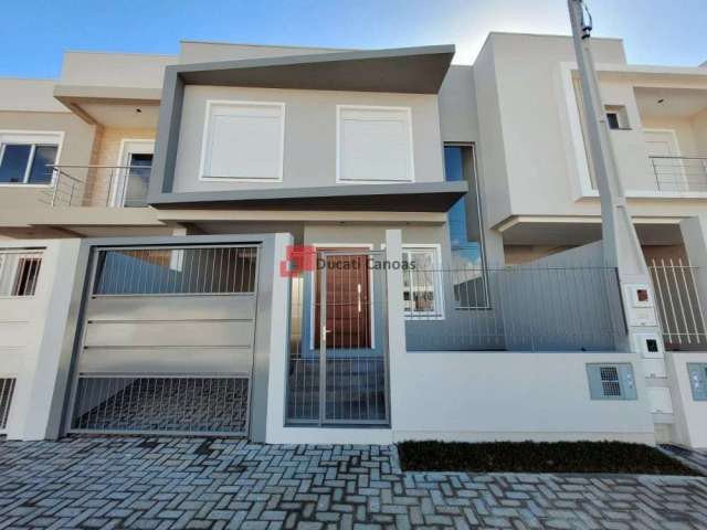 Casa com 3 quartos à venda na Rua Frei Henrique de Coimbra, Nossa Senhora das Graças, Canoas, 128 m2 por R$ 654.000