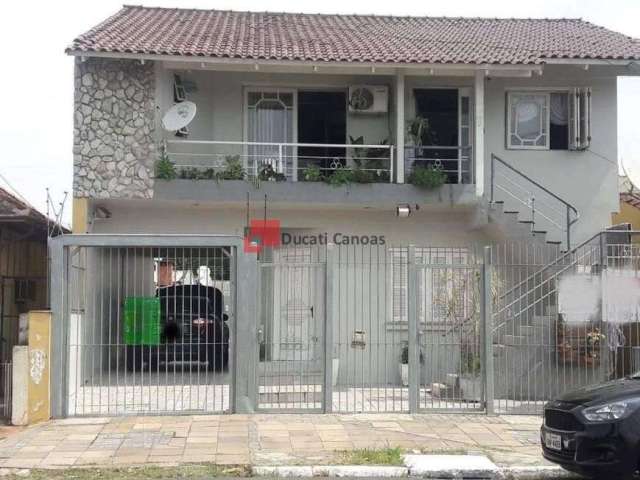 Casa com 4 quartos à venda na Rua Saldanha da Gama, Harmonia, Canoas, 290 m2 por R$ 607.000