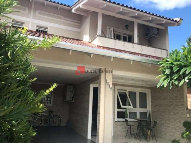 Casa com 3 quartos à venda na Rua Vinte e Dois de Abril, Nossa Senhora das Graças, Canoas, 300 m2 por R$ 1.300.000