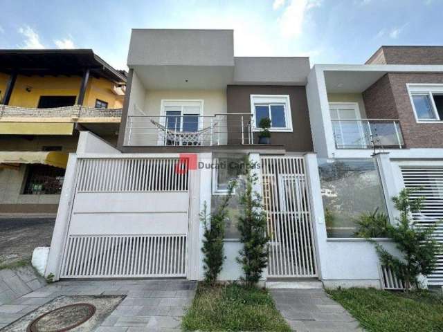 Casa com 3 quartos à venda na Rua das Petúnias, Estância Velha, Canoas, 150 m2 por R$ 780.000