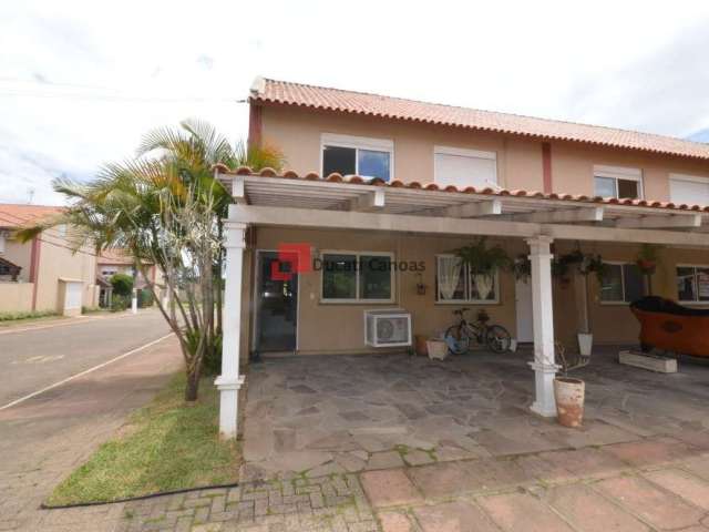 Casa em condomínio fechado com 2 quartos para alugar na Rua Treze de Maio, Rio Branco, Canoas, 106 m2 por R$ 2.350