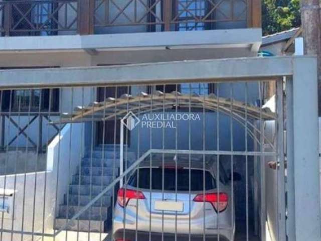 Casa em condomínio fechado com 2 quartos à venda na Rua Padre Hildebrando de Freitas Pedroso, 222, Tarumã, Viamão, 156 m2 por R$ 220.000