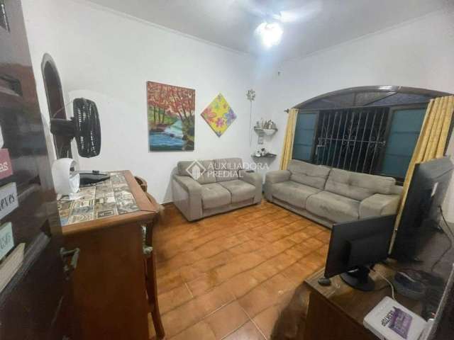 Casa em condomínio fechado com 2 quartos à venda na Rua Botões de Ouro, 437, Jardim Real, Praia Grande, 93 m2 por R$ 420.000