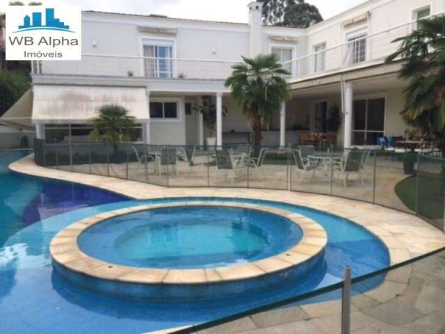 Casa a venda no residencial Tamboré 2, - 5 suítes, Home Theater, living para vários ambientes, cozinha repleta em armários, sala intima, escritório, Piscina, churrasqueira. ar condicionado em todas as