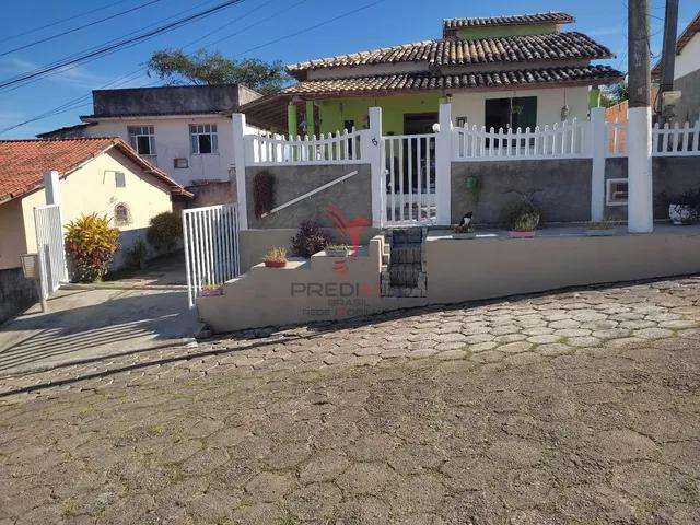 Venda de duas casas em Iguaba Grande, quintal varanda, cisterna com 12 mil litros. Garagem