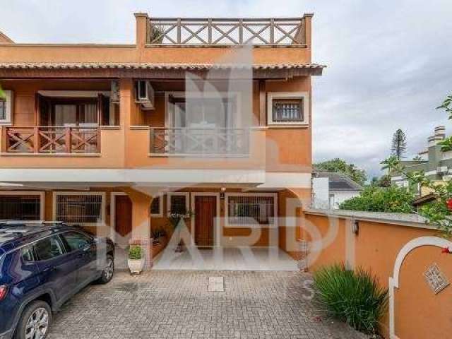 Casa em condomínio fechado com 3 quartos à venda na Rua General Rondon, 165, Tristeza, Porto Alegre por R$ 1.180.000