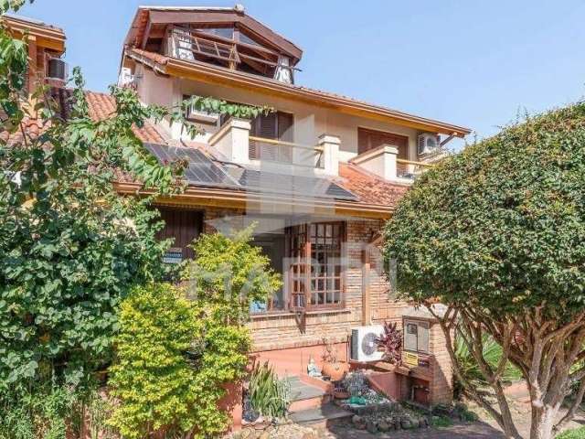 Casa em condomínio fechado com 3 quartos à venda na Avenida da Cavalhada, 6021, Cavalhada, Porto Alegre por R$ 560.000