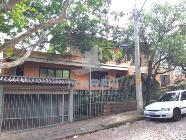 Casa com 4 quartos para alugar na Rua Fonseca Guimarães, 34, Medianeira, Porto Alegre por R$ 8.000