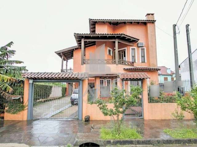 Casa com 4 quartos à venda na Ocimar Antonio Pereira, 79, Hípica, Porto Alegre por R$ 590.000