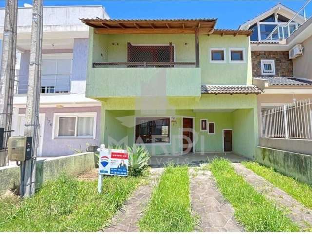 Casa com 3 quartos à venda na Rua Felipe Arísio, 186, Hípica, Porto Alegre por R$ 549.000