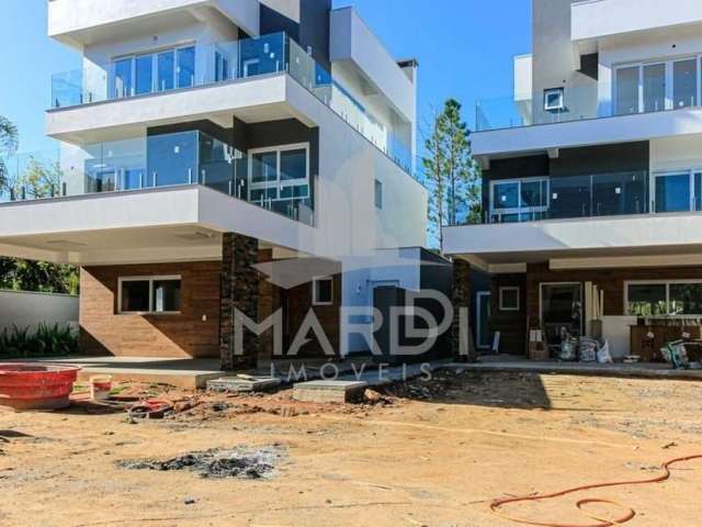 Casa em condomínio fechado com 3 quartos à venda na Avenida Coronel Marcos, 1239, Pedra Redonda, Porto Alegre por R$ 2.390.000