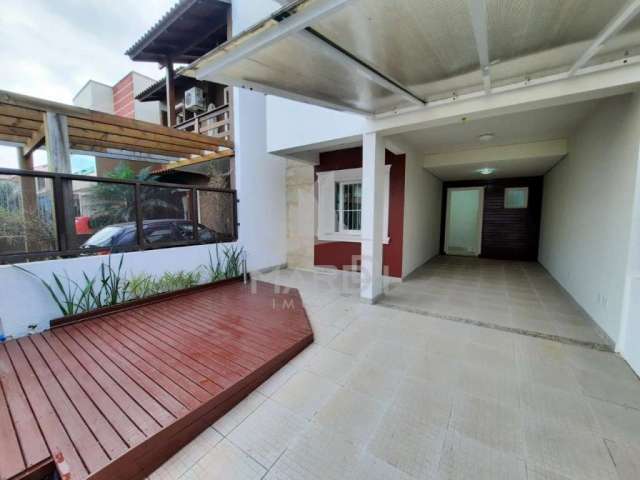 Casa com 3 quartos à venda na Rua Paulo Rogério Amoretty Souza, 100, Hípica, Porto Alegre por R$ 560.000