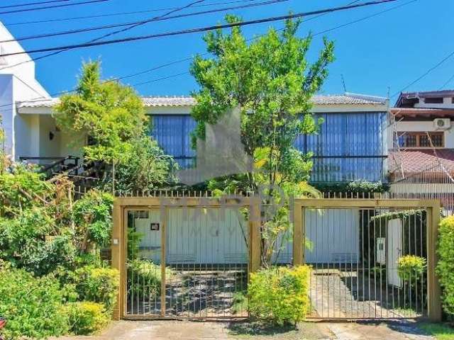 Casa com 3 quartos à venda na Rua Doutor Benjamin Camozato, 70, Jardim Isabel, Porto Alegre por R$ 1.370.000